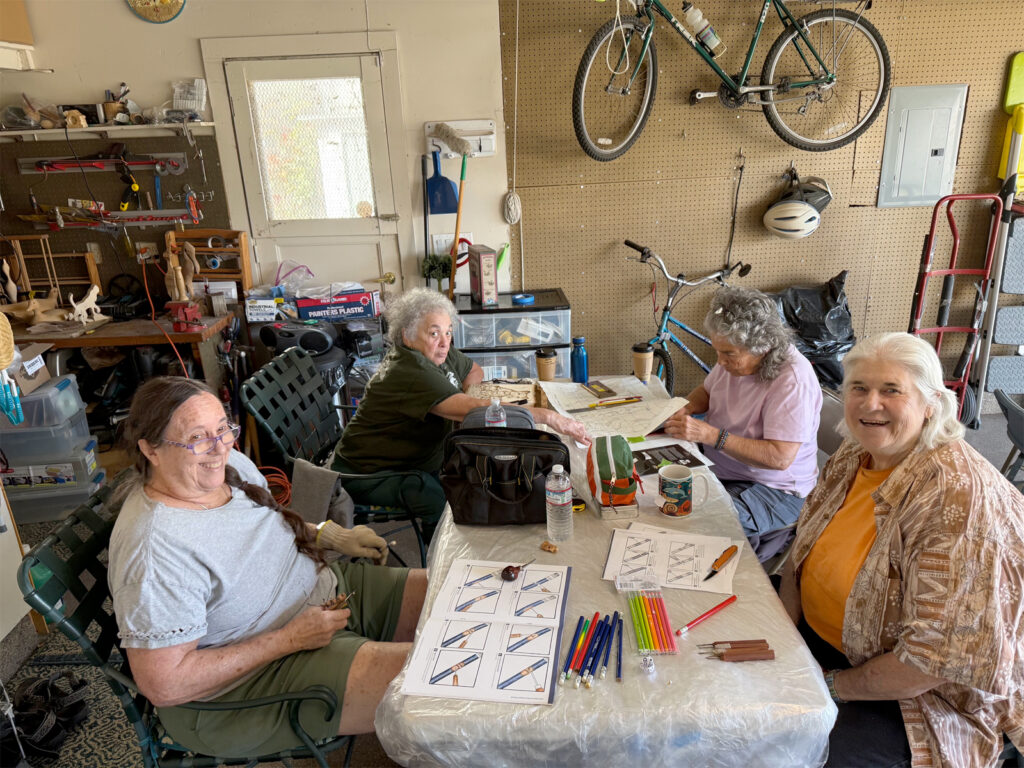 Second Saturday group at table July 2026